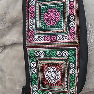 Stitched zippered clutch